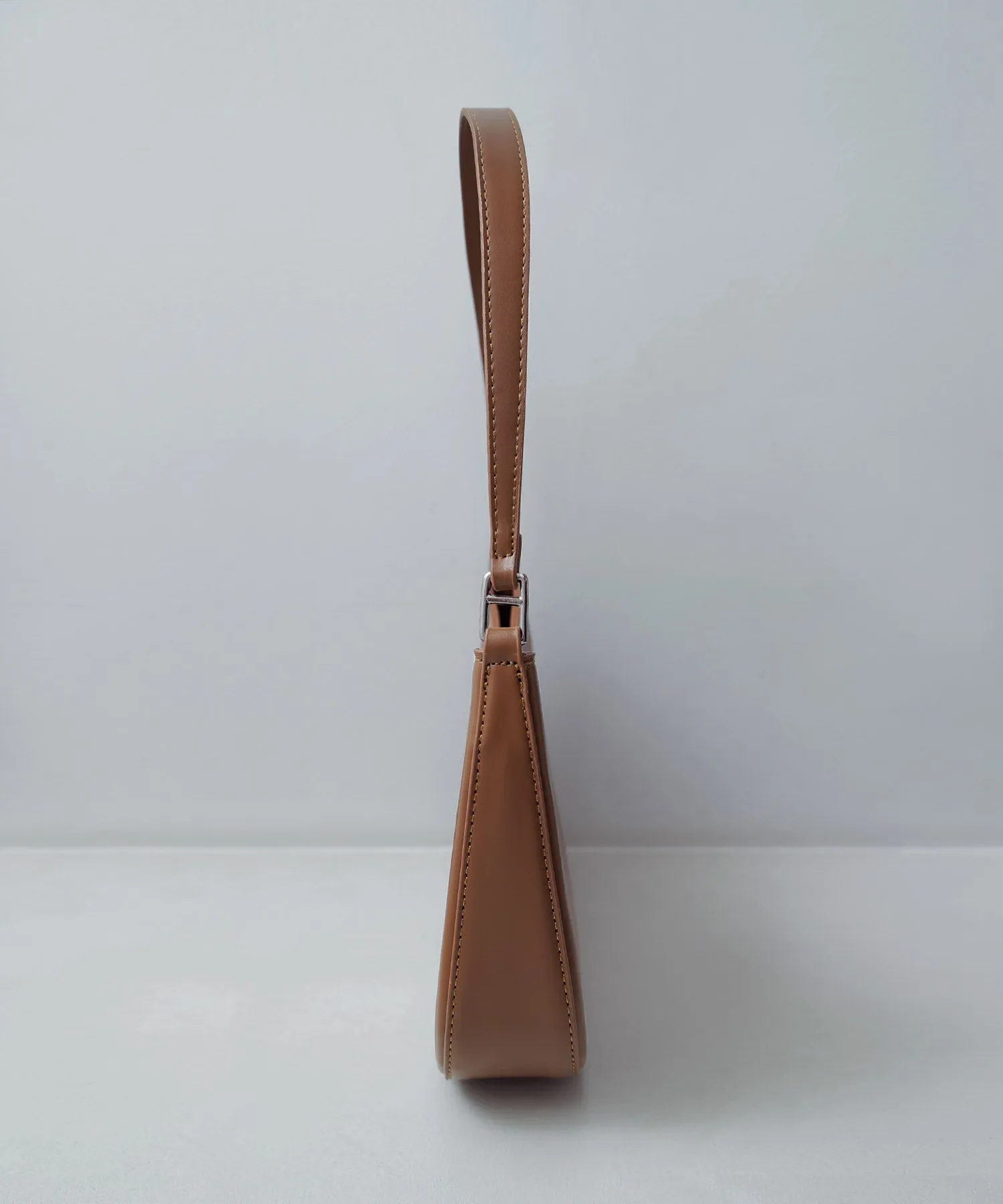 Round form one handle bag