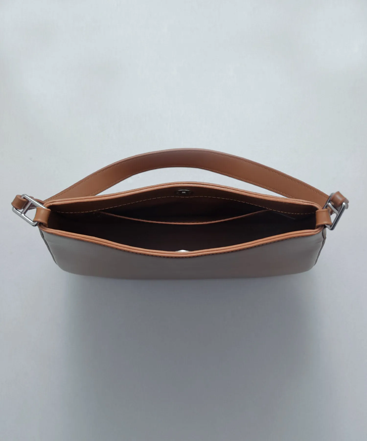 Round form one handle bag